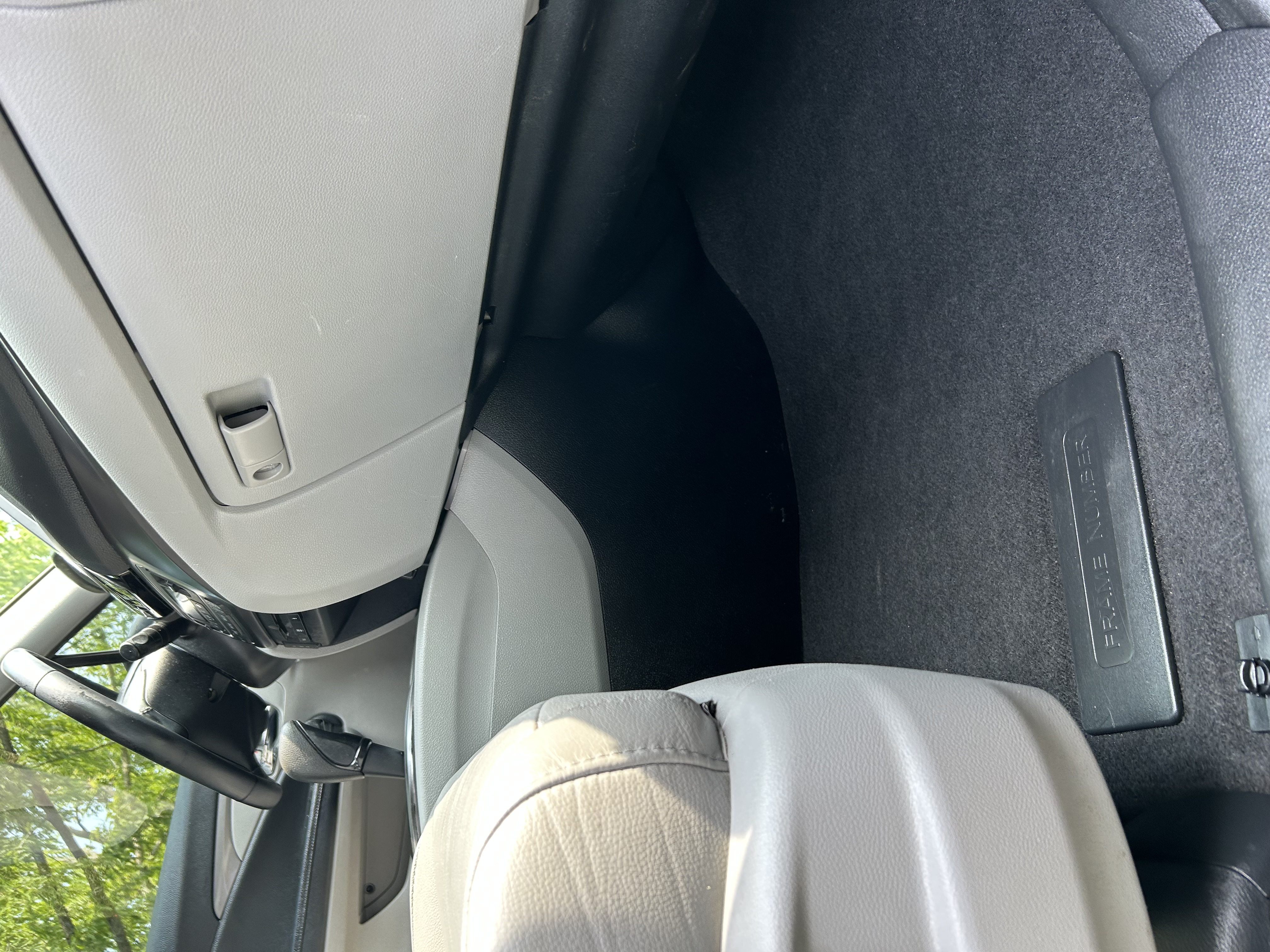Minivan B-pillar and carpet — clean after detail