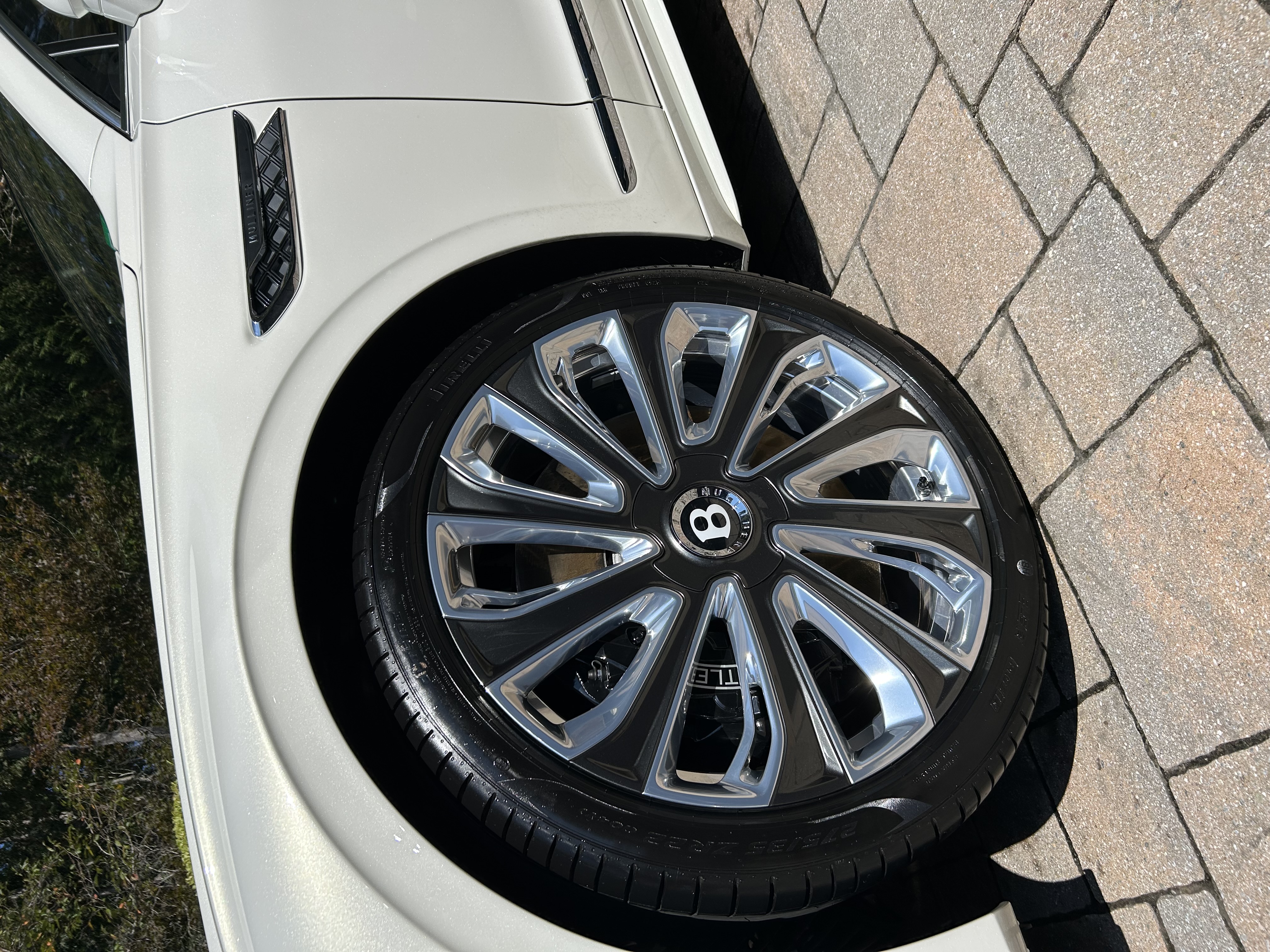 Bentley Bentayga — gleaming white front end after full detail
