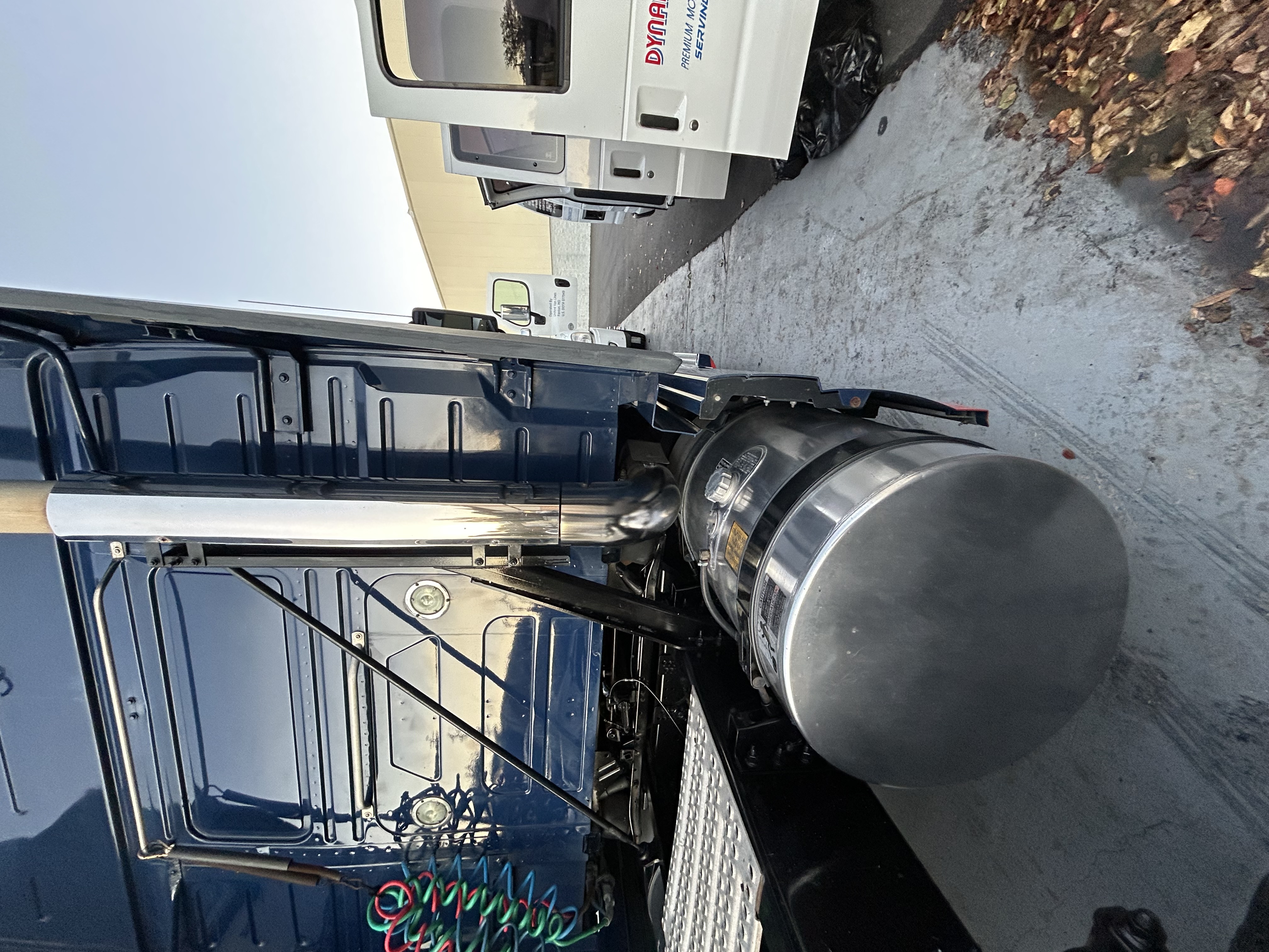 Hilldrup semi — mirror-finish cab side panel after detail