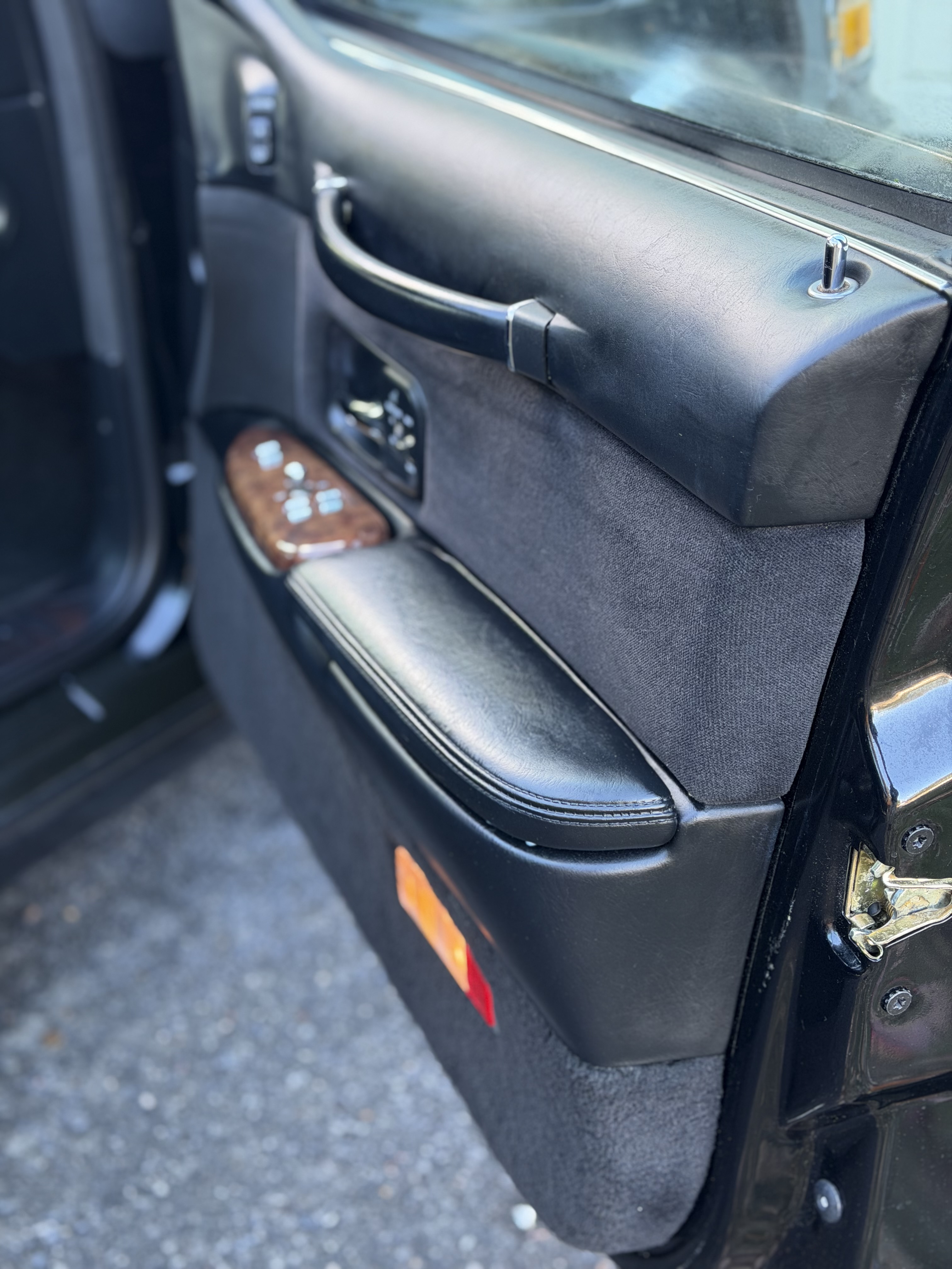 Lincoln Town Car — polished door panel and wood trim