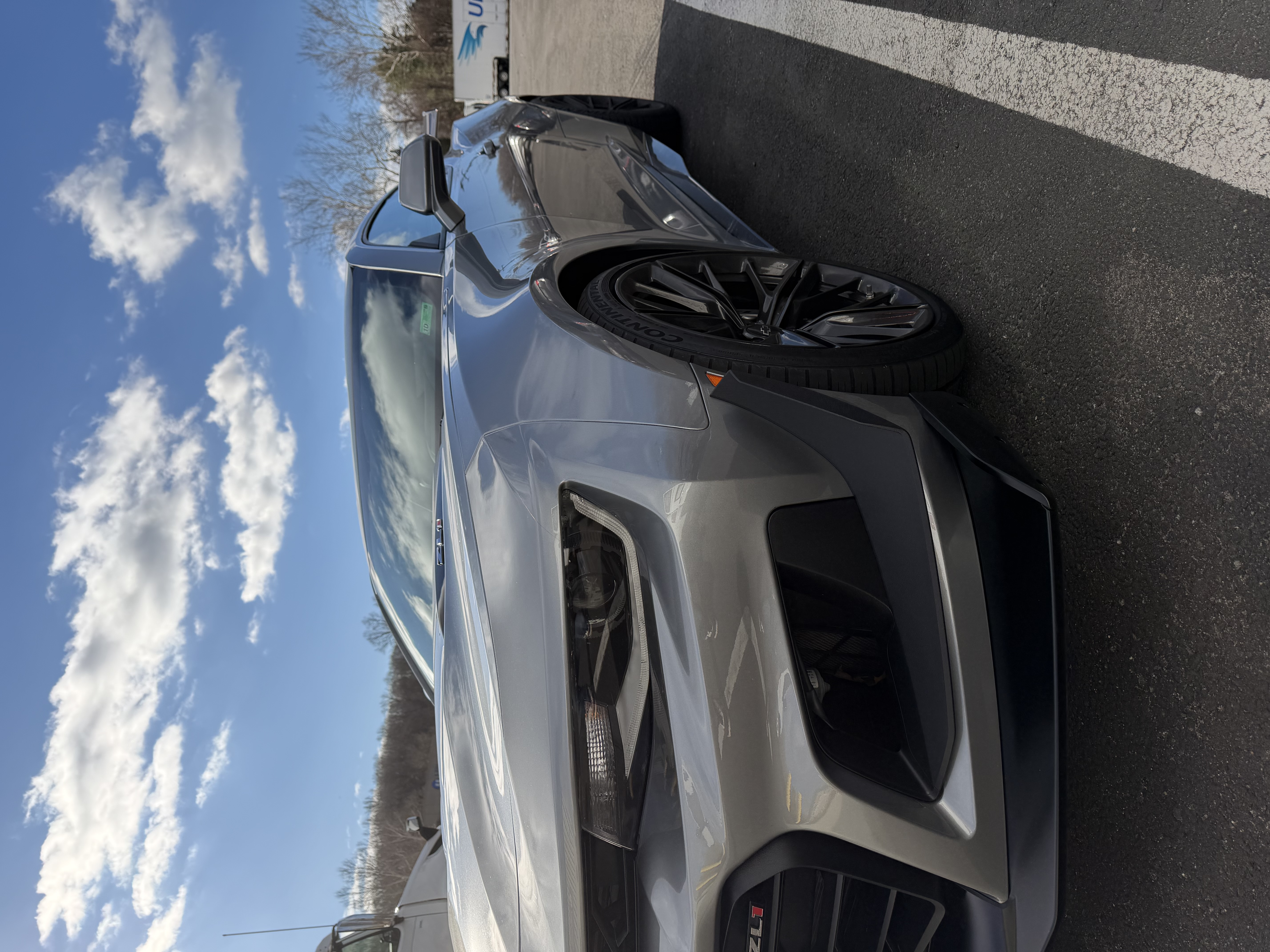 Camaro ZL1 — gleaming silver side profile after detail