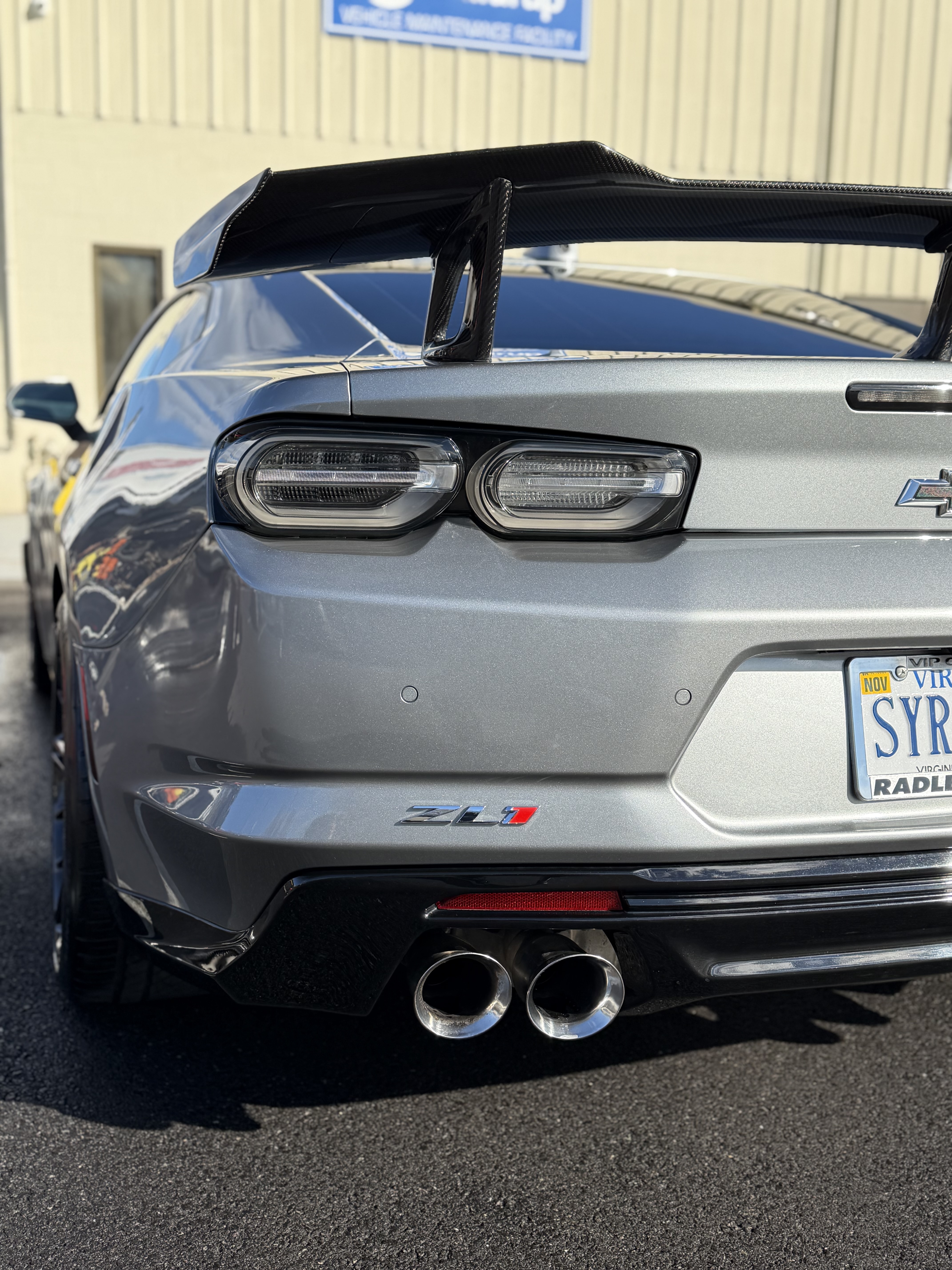 Camaro ZL1 — ZL1 badge and polished rear after detail