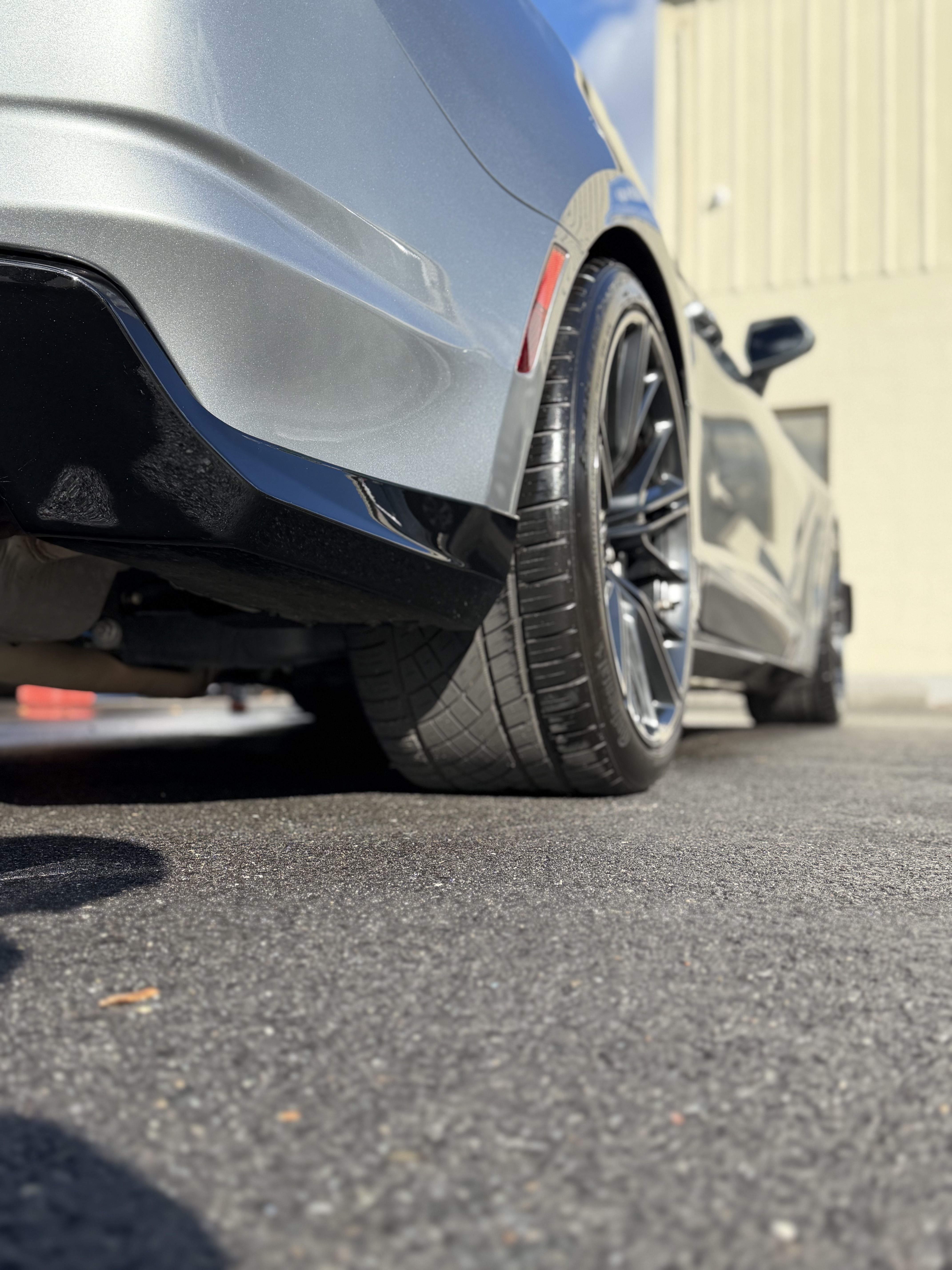 Camaro ZL1 — low angle rear bumper and wheel after detail