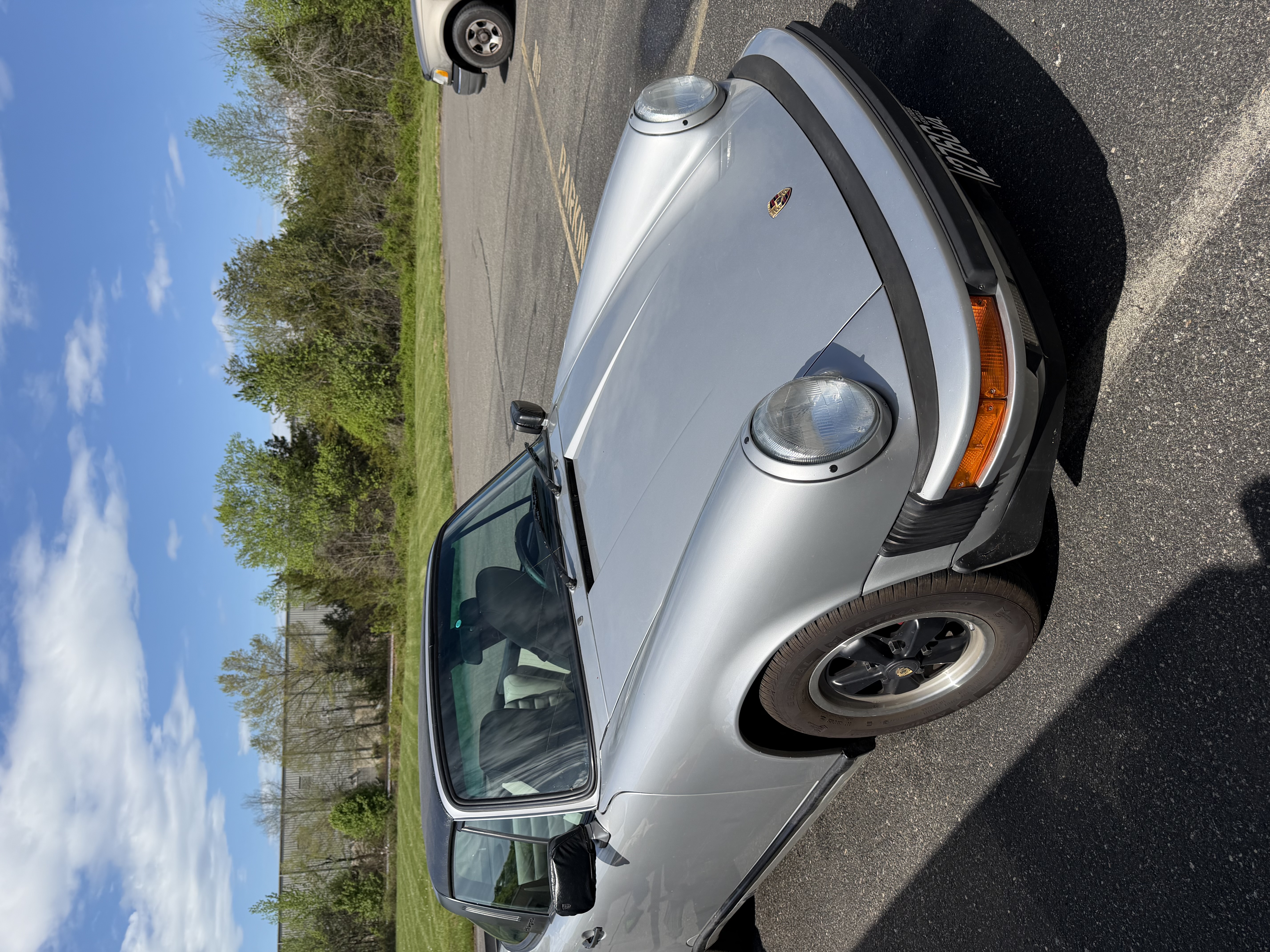 Silver Porsche 911 — showroom shine after detail