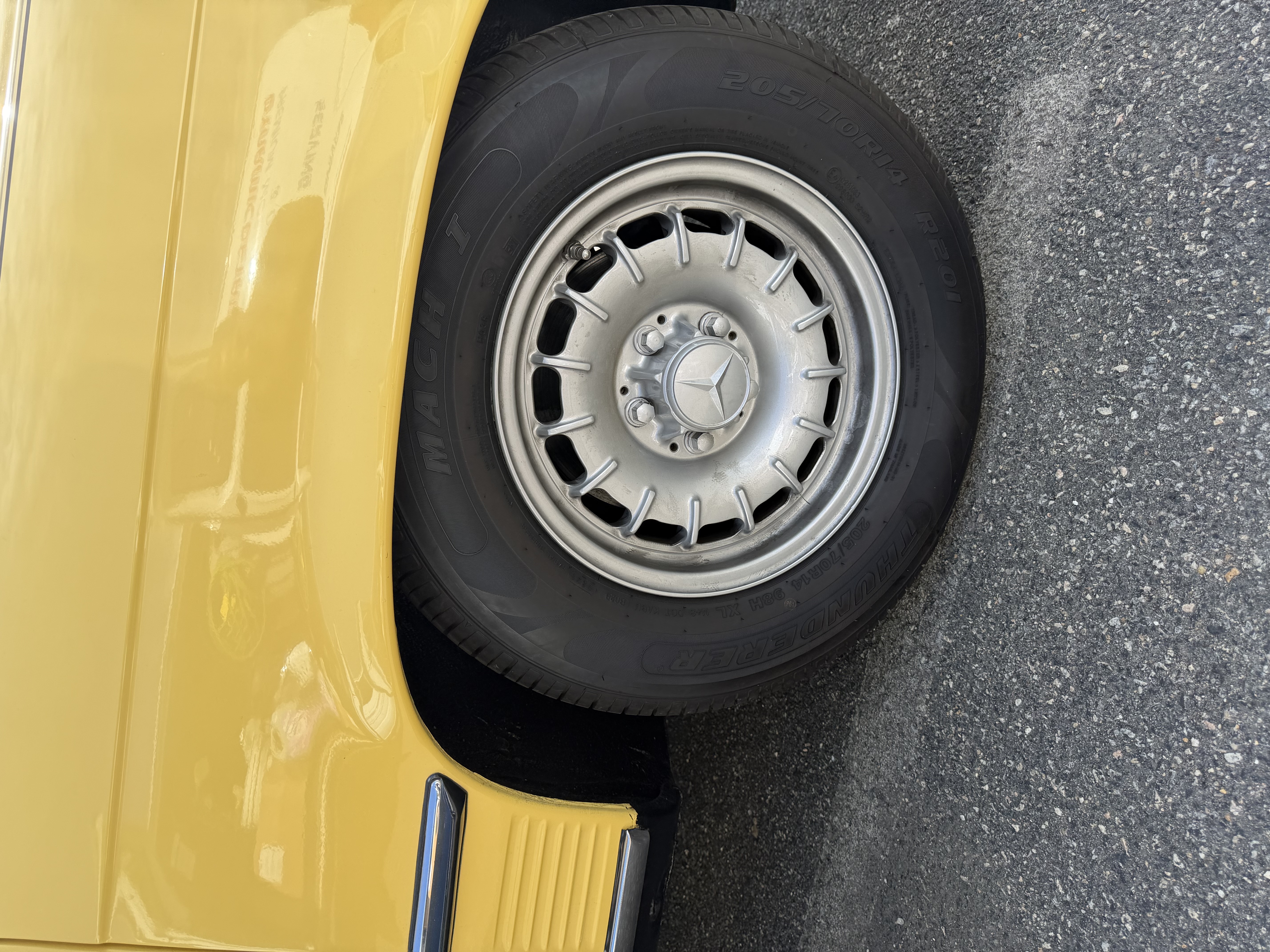 Yellow classic Mercedes — gleaming exterior