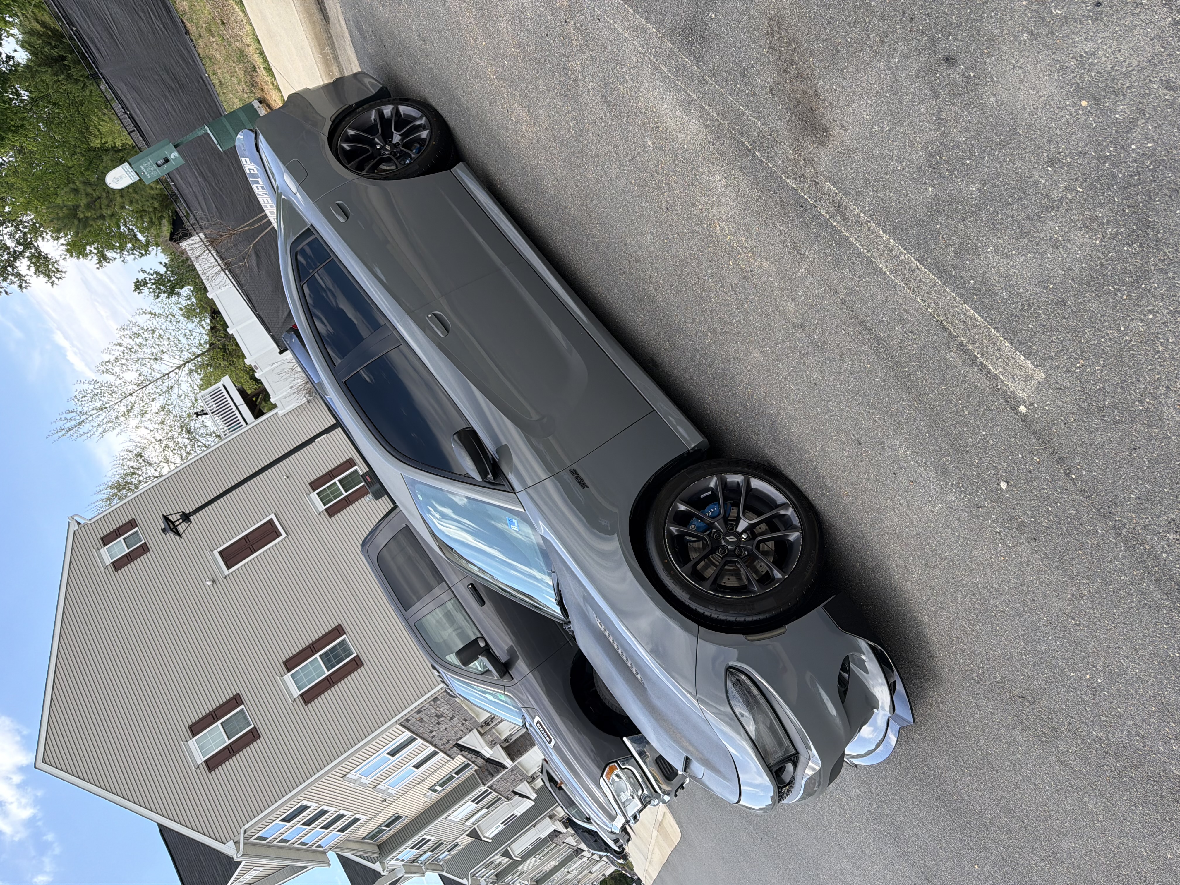 Silver Corvette — gleaming side profile after detail