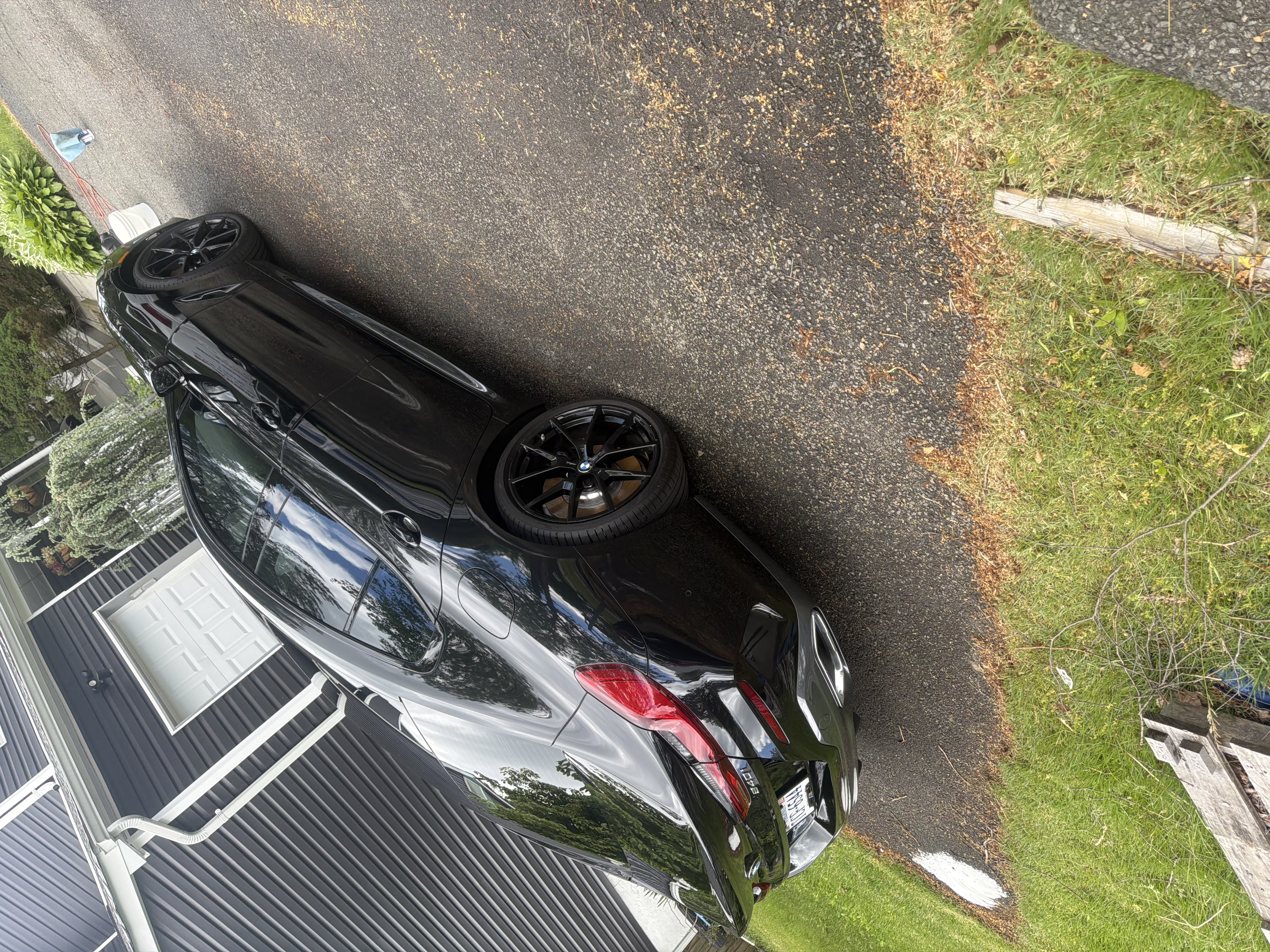 Black BMW — deep gloss paint after detail