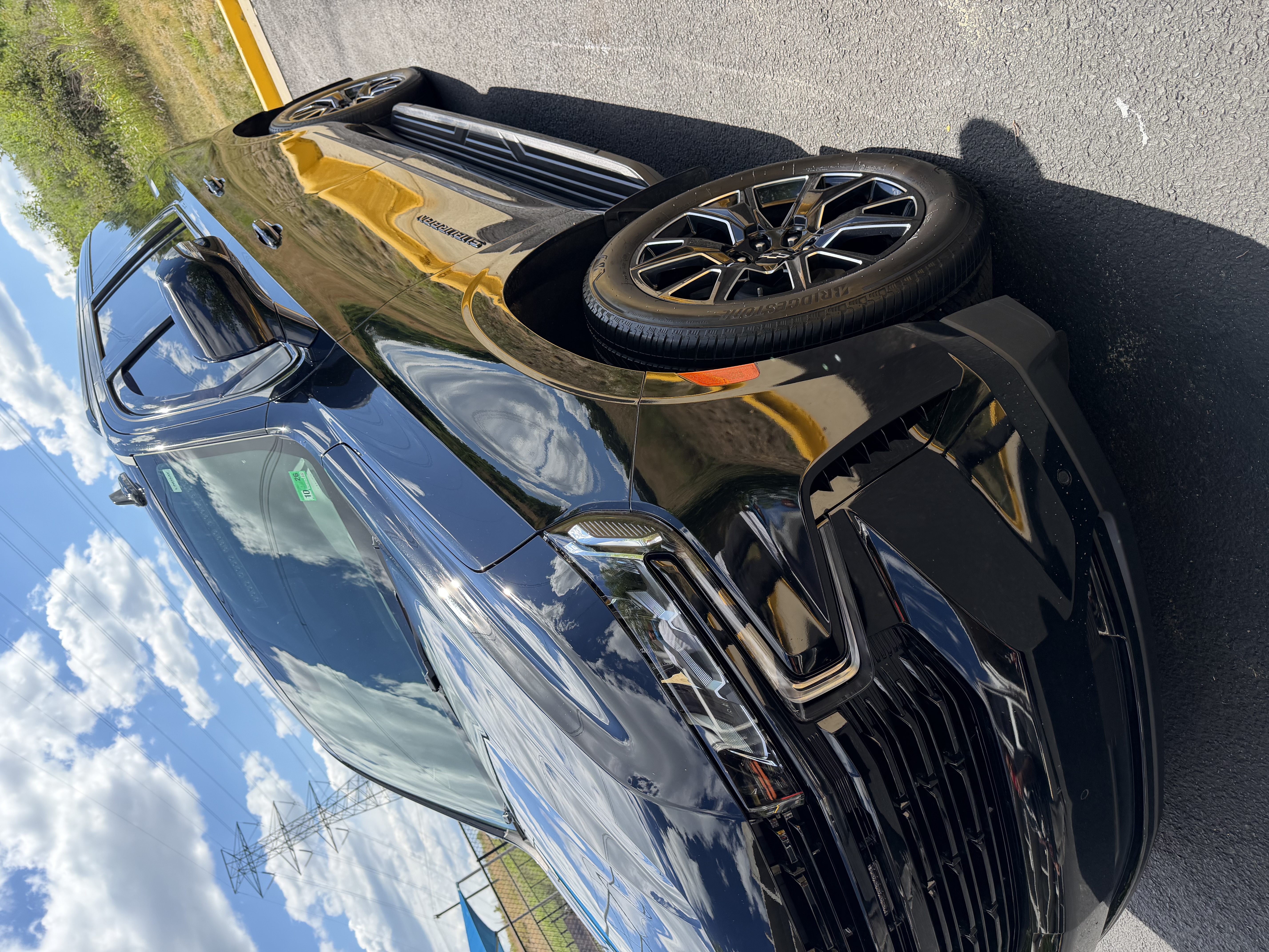 Black truck exterior — gleaming paint after detail